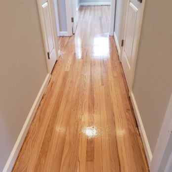 E-1 Services - a hallway with hardwood floors - Flooring Near Me E-1 Services - a hallway with hardwood floors - Flooring Near Me