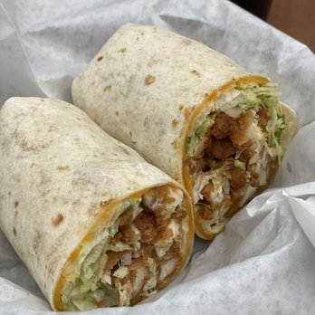Mayfair Bar - two burritos on a table - Sports Bars Near Me - Haslett, Michigan Mayfair Bar - two burritos on a table - Sports Bars Near Me - Haslett, Michigan