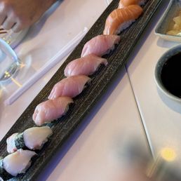 Salmon sushi, yellowtail sushi and Octopus sushi Salmon sushi, yellowtail sushi and Octopus sushi