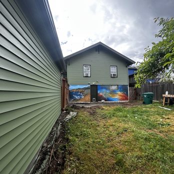 T&Z Logistics - Railroad ties next to garage gone - Junk Removal & Hauling Near Me - Bellevue, Washington