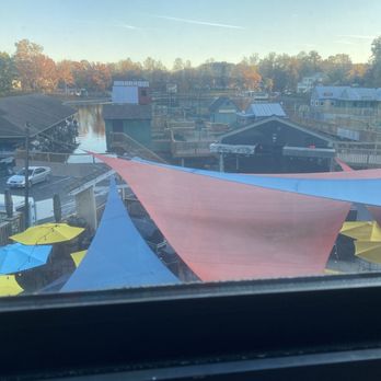 Moosie's - View of lakefront mini golf from our indoor seating - Bars Near Me - Moneta, Virginia