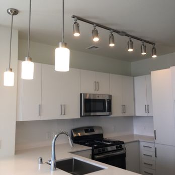 Ely on Fremont - My kitchen is perfect for cooking. It opens up to an entertainment space that looks onto the Sunrise Mountains! - Apartments Near Me - Las Vegas, Nevada Ely on Fremont - My kitchen is perfect for cooking. It opens up to an entertainment space that looks onto the Sunrise Mountains! - Apartments Near Me - Las Vegas, Nevada
