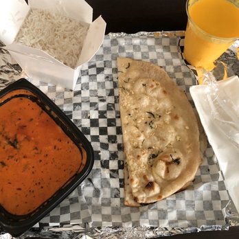 Spicy India - Great Chicken Tikki Masala with Garlic Naan and Mango Lassi. - Indian Near Me - Abilene, Texas Spicy India - Great Chicken Tikki Masala with Garlic Naan and Mango Lassi. - Indian Near Me - Abilene, Texas