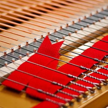 Reeder Pianos - New piano strings on a restored piano. - Piano Services Near Me - Lansing, Michigan Reeder Pianos - New piano strings on a restored piano. - Piano Services Near Me - Lansing, Michigan