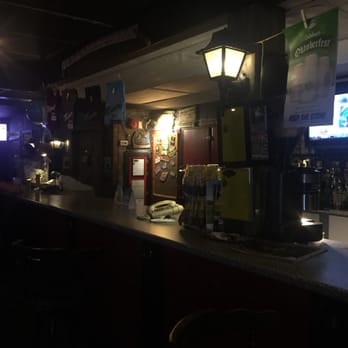 Miner's Tavern Cobalt - a bar with a television in the background - Bars Near Me - Cobalt, Ontario Miner's Tavern Cobalt - a bar with a television in the background - Bars Near Me - Cobalt, Ontario
