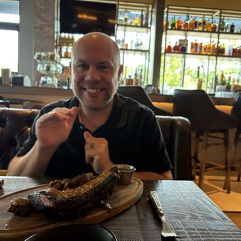 Fogo de Chão - "The Bone" beef rib- happy hour - Brazilian Near Me - Lynnwood, Washington