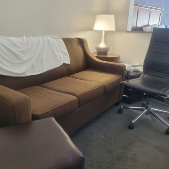 Comfort Suites Ocala North - Fold out sofa and ottomans. Plus the chair from the desk - Hotels Near Me - Ocala, Florida