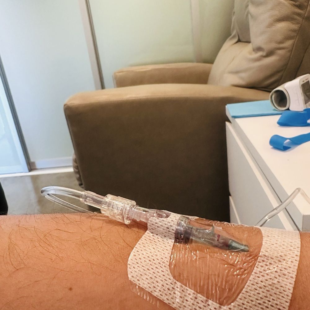 IV & Wellness Lounge - IV drip with connector that twists and moves the needle, uncomfortable setup - IV Hydration Near Me - Long Beach, California