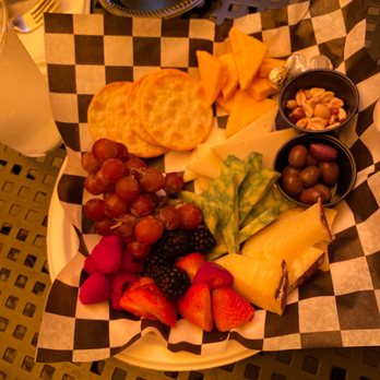 Two Goats & The Goose - a plate of fruit and cheese - New American Near Me - Bakersfield, California