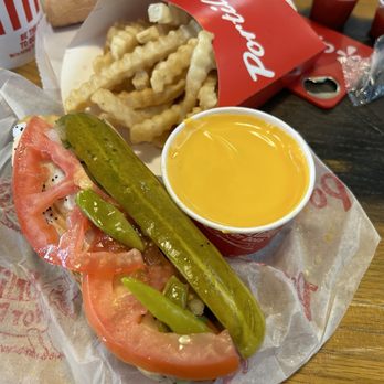 Portillo's Gilbert - Portillo's Beef Hot Dog and Cheese Fries - Salad Near Me - Gilbert, Arizona