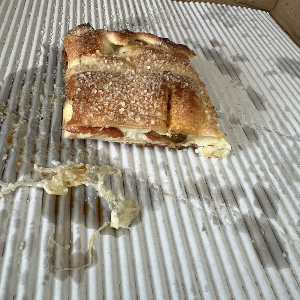 Jery's Pizza - What's left of a Pepperoni calzone add jalapeños - Pizza Near Me - Spring Valley, California Jery's Pizza - What's left of a Pepperoni calzone add jalapeños - Pizza Near Me - Spring Valley, California