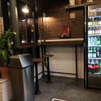 Rosa's Pizza - Window seating + drink cooler - Pizza Near Me - Brooklyn, New York Rosa's Pizza - Window seating + drink cooler - Pizza Near Me - Brooklyn, New York