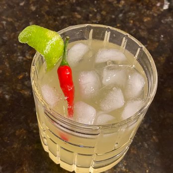 Wok Theology - a drink with ice, lime, and a chili - Personal Chefs Near Me Wok Theology - a drink with ice, lime, and a chili - Personal Chefs Near Me