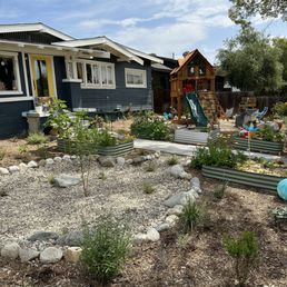 LADWP turf rebate project. Completely native landscape with vegetated swale, veggie beds and play area.