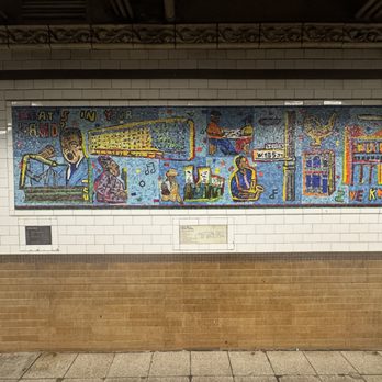 MTA - 135th St. Subway Station - 2 - 3 - 135th St Lenox Ave Line Subway Station (2,3) - Willie Birch "Harlem Timeline" 1995, left half "What's in My Hand?" on Downtown side - Metro Stations Near Me - New York, New York MTA - 135th St. Subway Station - 2 - 3 - 135th St Lenox Ave Line Subway Station (2,3) - Willie Birch "Harlem Timeline" 1995, left half "What's in My Hand?" on Downtown side - Metro Stations Near Me - New York, New York
