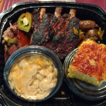 Dinosaur Bar-B-Que - Combo meal- 3 meats and 2 sides. Pictured is st. Louis ribs, brisket, and a hot link sausage. Comes with cornbread. - Barbeque Near Me - Rochester, New York