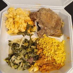 Dani Love’s Cooking - Pork chop, yellow rice, greens mac and cheese