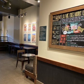 Starbucks - a coffee shop with a menu on the wall - Coffee & Tea Near Me - Westmount, Quebec