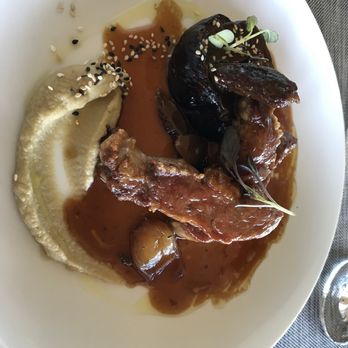 Amics - Pork entree. - Mediterranean Near Me - Gratallops, T