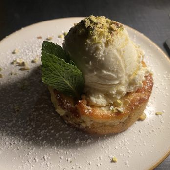 No Ordinary Rabbit - Pistachio gooey butter cake with honey vanilla ice cream - Wine Bars Near Me - St. Louis, Missouri No Ordinary Rabbit - Pistachio gooey butter cake with honey vanilla ice cream - Wine Bars Near Me - St. Louis, Missouri