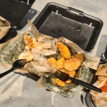 Wingstop - a tray of food and a fork - Chicken Wings Near Me - Saratoga Springs, Utah Wingstop - a tray of food and a fork - Chicken Wings Near Me - Saratoga Springs, Utah