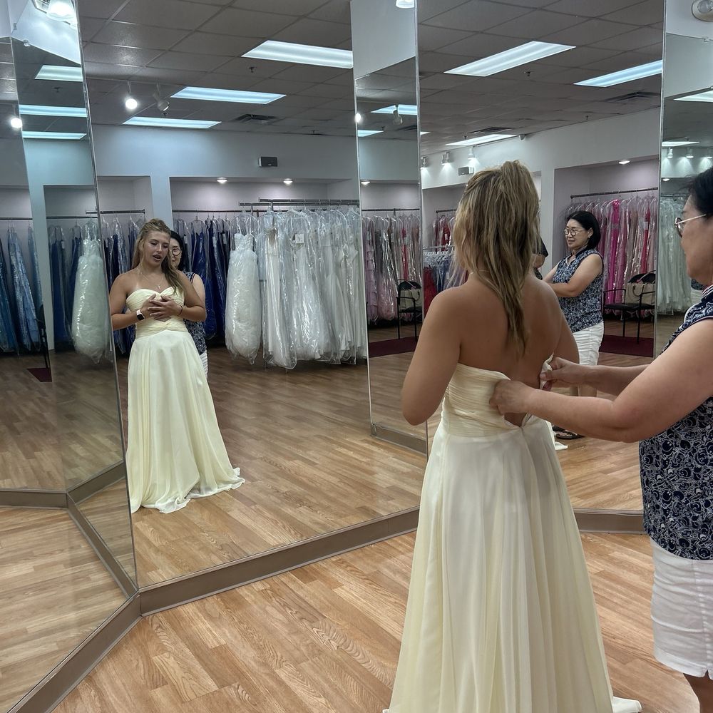 Nouri Formals - Discussing skin tone, color theory, and the "wow" factor this dress didn't have another one did have, albeit the yellow dress is beautiful. - Formal Wear Near Me - Little Rock, Arkansas Nouri Formals - Discussing skin tone, color theory, and the "wow" factor this dress didn't have another one did have, albeit the yellow dress is beautiful. - Formal Wear Near Me - Little Rock, Arkansas
