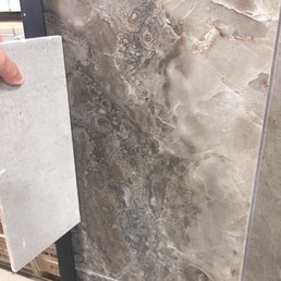 The tile is really inexpensive. My bathroom alone will cost $48! These guys are amazing! Know your square footage and BAMM!