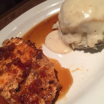 Cheddar's Scratch Kitchen - Bourbon- glazed Salmon with mashed potatoes and white gravy. - Comfort Food Near Me - Pensacola, Florida Cheddar's Scratch Kitchen - Bourbon- glazed Salmon with mashed potatoes and white gravy. - Comfort Food Near Me - Pensacola, Florida