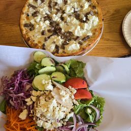 White pizza with meatballs and blackened chicken salad. White pizza with meatballs and blackened chicken salad.