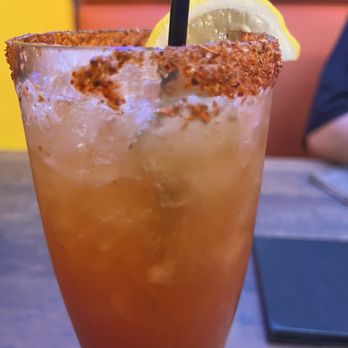 Tipzy's Tacos & Beer - Michelada...came with olives n pickled veggies but the hubby ate them. - Mexican Near Me - Fresno, California