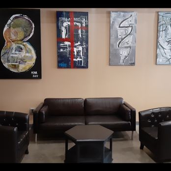 Leona's Pizza - a living room with leather furniture - Bars Near Me - Eau Claire, Wisconsin Leona's Pizza - a living room with leather furniture - Bars Near Me - Eau Claire, Wisconsin