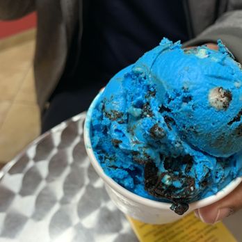 Yo Go Wild - a person holding a bowl of blue ice cream - Ice Cream & Frozen Yogurt Near Me - Deer Park, New York Yo Go Wild - a person holding a bowl of blue ice cream - Ice Cream & Frozen Yogurt Near Me - Deer Park, New York