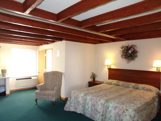 Room Gallery - At Forty Winks Inn, we believe that a good night's sleep is the cornerstone of a great stay. Our beds are carefully selected for their superior comfort, featuring plush mattresses, soft linens, and supportive pillows that cradle you in restful tranquility. We understand the importance of quality sleep, which is why we've gone the extra mile to ensure our beds provide the perfect balance of softness and support. Come experience the best sleep of your life at Forty Winks Inn. Book your stay today and wake up refreshed and rejuvenated! Room Gallery - At Forty Winks Inn, we believe that a good night's sleep is the cornerstone of a great stay. Our beds are carefully selected for their superior comfort, featuring plush mattresses, soft linens, and supportive pillows that cradle you in restful tranquility. We understand the importance of quality sleep, which is why we've gone the extra mile to ensure our beds provide the perfect balance of softness and support. Come experience the best sleep of your life at Forty Winks Inn. Book your stay today and wake up refreshed and rejuvenated!