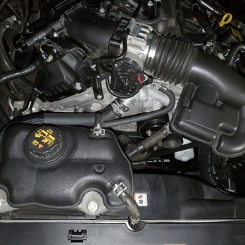 Atech Auto Repair - New upper and lower radiator hoses.. Clean engine bay after coolant service. - Auto Repair Near Me - Daly City, California