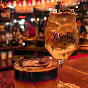 Darling - a drink and a drink glass on a bar - Bars Near Me - Montreal, Quebec Darling - a drink and a drink glass on a bar - Bars Near Me - Montreal, Quebec