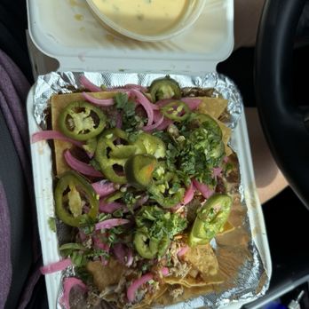 Irene’s BBQ - Chipotle Chicken nachos with straight from the refrigerator cold chicken. - Barbeque Near Me - Columbia, Missouri Irene’s BBQ - Chipotle Chicken nachos with straight from the refrigerator cold chicken. - Barbeque Near Me - Columbia, Missouri
