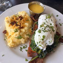 Eggs, Benedict and cheesy bacon grits delicious Eggs, Benedict and cheesy bacon grits delicious