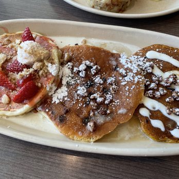 Snooze, an A.M. Eatery - Pancake Flight (Strawberry Shortcake, Cinnamon Roll, and Pumpkin Pecan) - Breakfast & Brunch Near Me - Houston, Texas Snooze, an A.M. Eatery - Pancake Flight (Strawberry Shortcake, Cinnamon Roll, and Pumpkin Pecan) - Breakfast & Brunch Near Me - Houston, Texas
