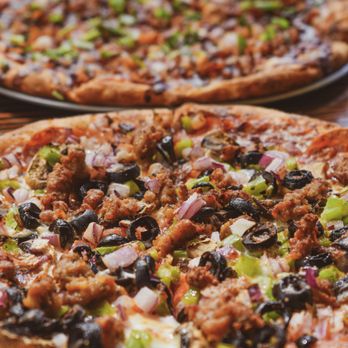 Da Pizza Place - two pizzas on a table - Pizza Near Me - Waimea, Hawaii Da Pizza Place - two pizzas on a table - Pizza Near Me - Waimea, Hawaii