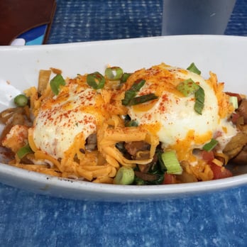 Raglans - Hippie Hash - two poached eggs with hash browns, spinach, tomato, onion, sharp cheddar and roasted mushrooms. - American Near Me - North Vancouver, British Columbia Raglans - Hippie Hash - two poached eggs with hash browns, spinach, tomato, onion, sharp cheddar and roasted mushrooms. - American Near Me - North Vancouver, British Columbia