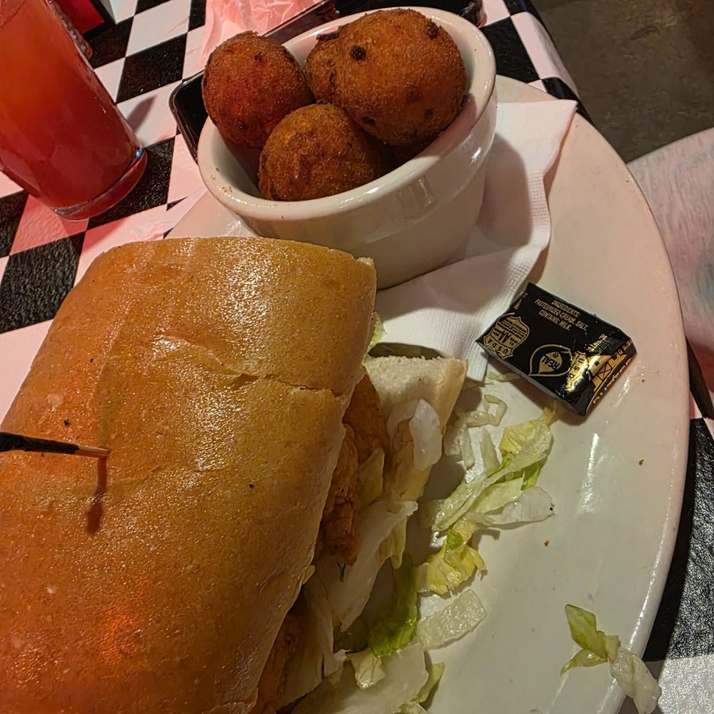 Acme Oyster House - Half Shrimp Po-boy with hush puppies - Seafood Near Me - Metairie, Louisiana Acme Oyster House - Half Shrimp Po-boy with hush puppies - Seafood Near Me - Metairie, Louisiana
