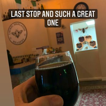 Laurel Highlands Meadery - a hand holding a glass of wine - Meaderies Near Me - Greensburg, Pennsylvania