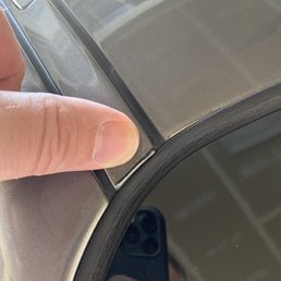Crooked install with urethane stuck to the paint.