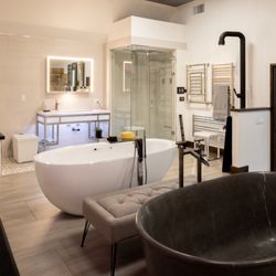 Faucets N Fixtures - This is the wellness area in the back that shows wellness therapies in working product so you can test it out!