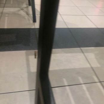 Dulles Town Center - Here he is crawling up the chair..... - Shopping Centers Near Me - Dulles, Virginia