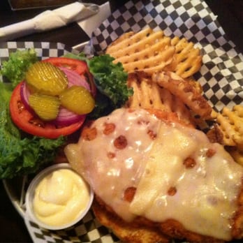 Coaches Bar & Grill - Huge pork tenderloin sandwich - Sports Bars Near Me - Bloomington, Indiana