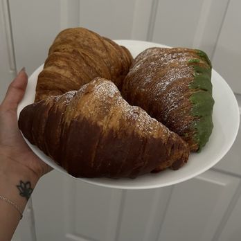 Daily Grinds - original, chocolate, and matcha croissant - Coffee & Tea Near Me - Frisco, Texas Daily Grinds - original, chocolate, and matcha croissant - Coffee & Tea Near Me - Frisco, Texas