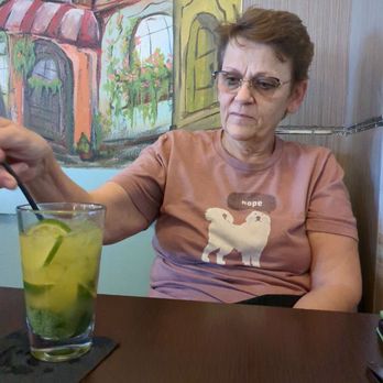 Cuban Island Restaurant - Vicky with a delicious, very strong, mango mojito - Cuban Near Me - Indialantic, Florida