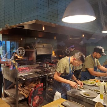 Campfire - 12 ft wood fire grill. - New American Near Me - Carlsbad, California Campfire - 12 ft wood fire grill. - New American Near Me - Carlsbad, California