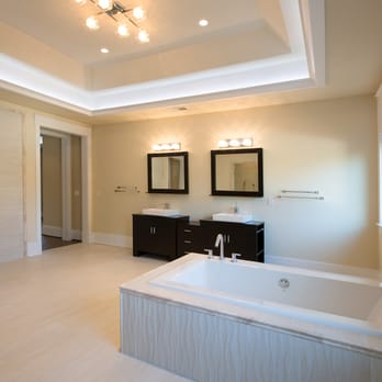 CCDC International - a bathroom with a large tub - General Contractors Near Me CCDC International - a bathroom with a large tub - General Contractors Near Me